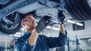 Portrait,Shot,Of,A,Handsome,Mechanic,Working,On,A,Vehicle